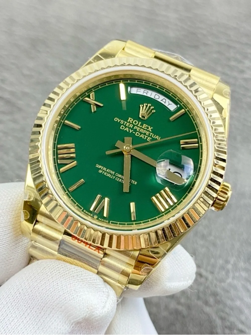 Rolex Day-Date 40 Green Roman Yellow Gold
